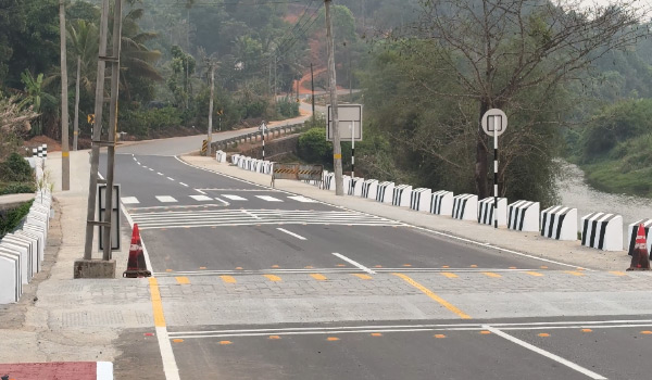 നിര്‍മ്മാണം പൂര്‍ത്തിയായ പാലവും റോഡും നാടിന് സമര്‍പ്പിക്കും